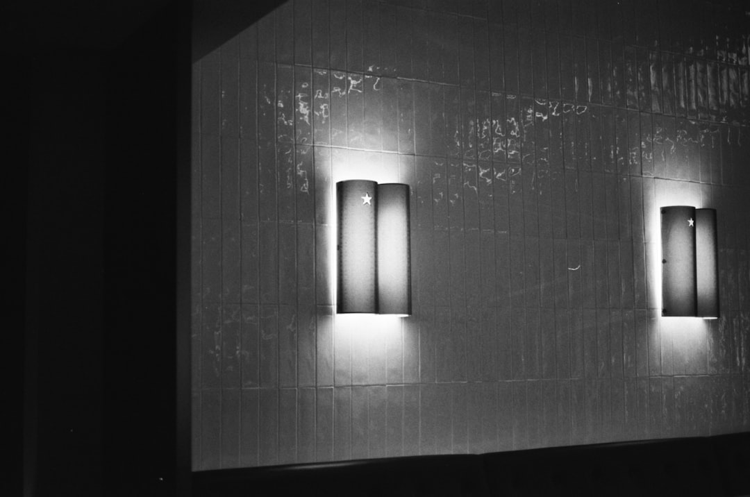 Photo etched glass wall lamp